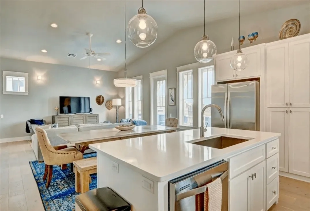 Devin Elder (DJE Texas) — Port Aransas beach house — Gourmet kitchen with quartz island 717 Sunrise Ave Port Aransas TX — beach house — Gourmet kitchen with quartz island
