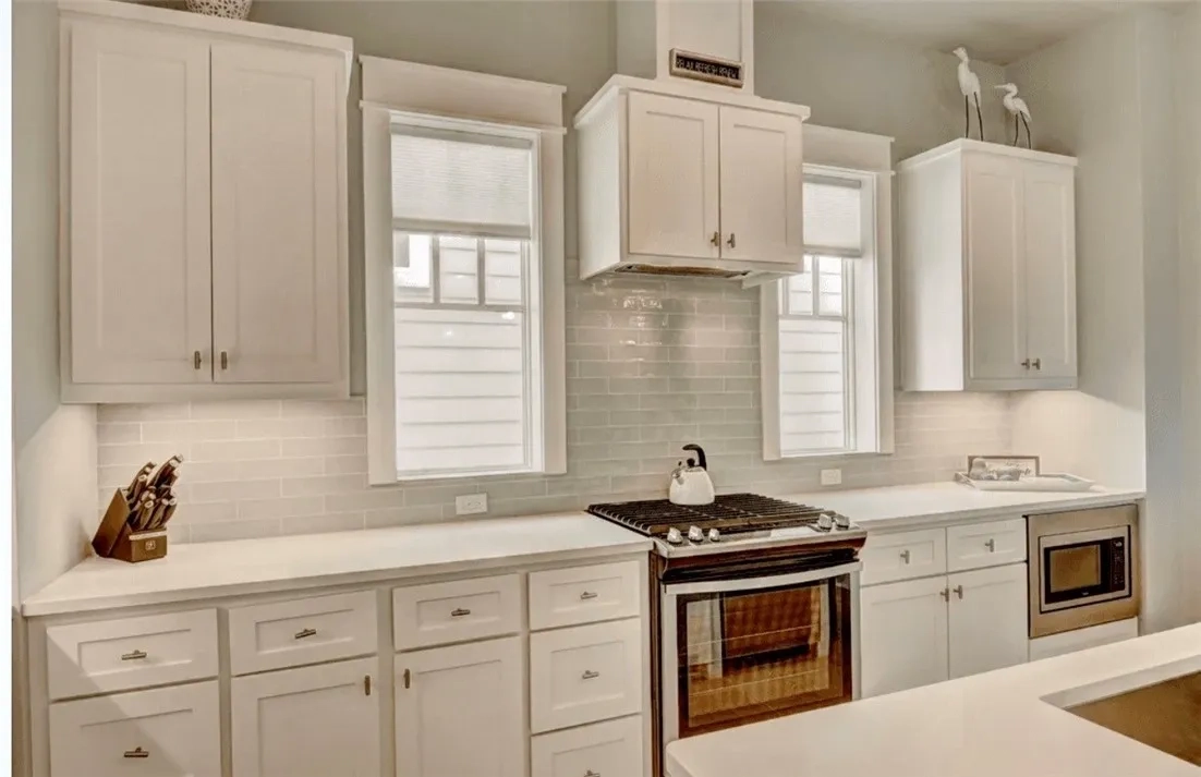Devin Elder (DJE Texas) — Port Aransas beach house — Custom cabinetry & gas range 717 Sunrise Ave Port Aransas TX — beach house — Custom cabinetry & gas range